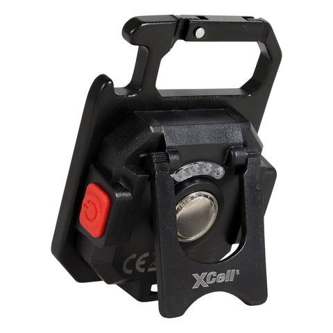 Back of light with red button on a white background