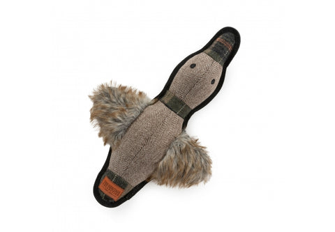 Dog toy resembling a duck with textured surface and fur-like tail on a white background