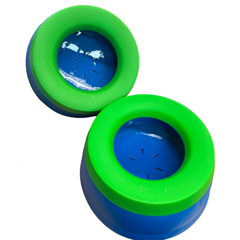 Two blue and green bowls on a white background