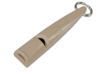 nougat coloured dog whistle with a metal ring on a white background