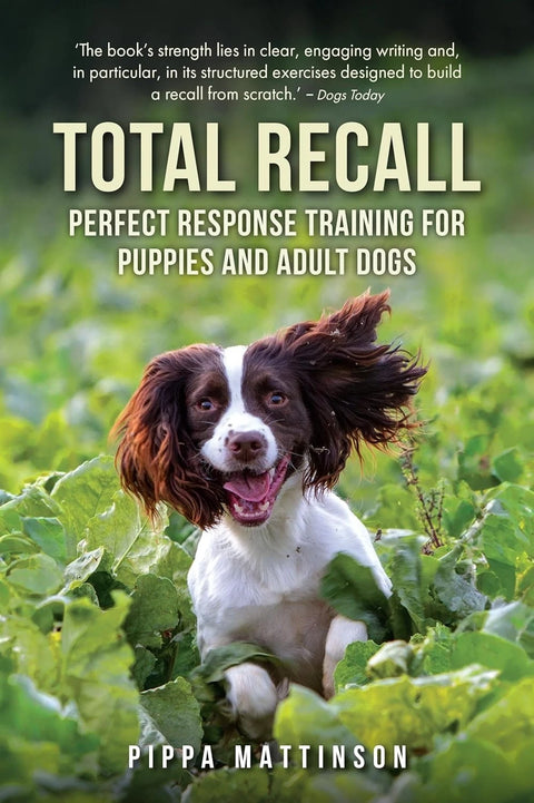Book cover of 'Total Recall: Perfect Response Training for Puppies and Adult Dogs' with a dog in a grassy field.