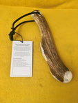 priest with toggle and paperwork