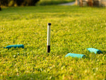 marking stick stuck in ground
